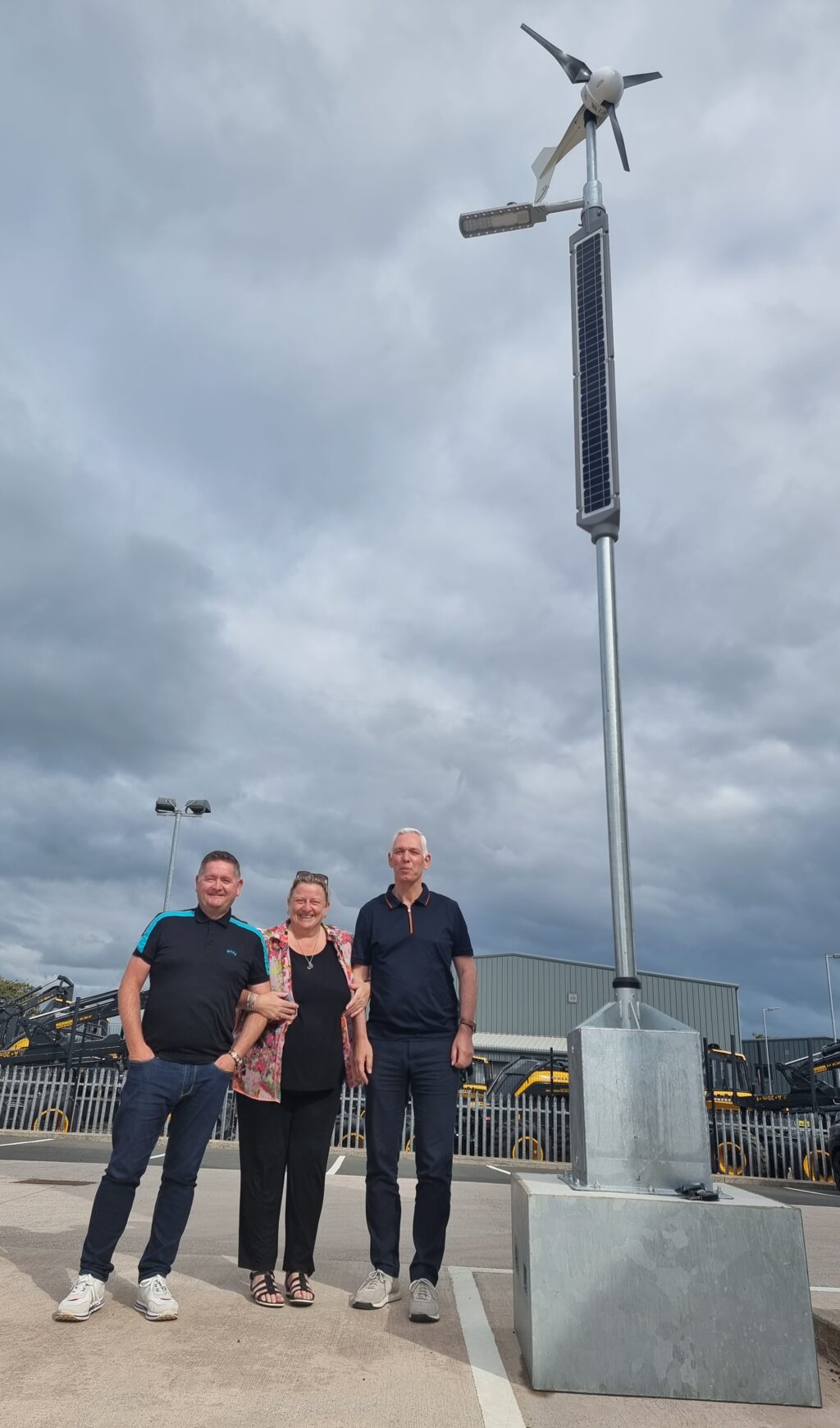Eddie Black, Managing Director of Eco Group, with Linda Page and Lawrence Fagg from Kight Off-Grid Solutions next to the Eco Off-Grid lighting system at Eco's HQ in Annan (1) (1)