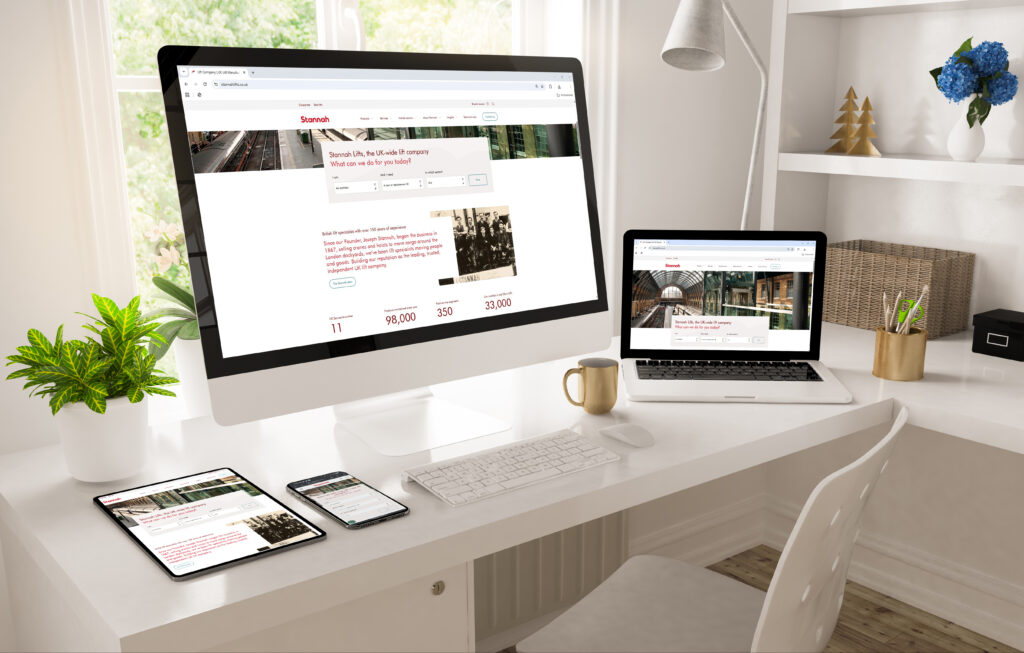 home office desktop showing website creator